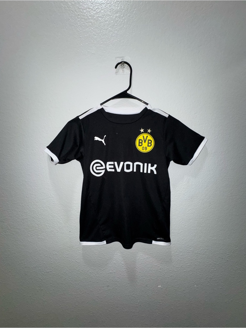 Puma Black Kids Soccer Jersey with Yellow Crest